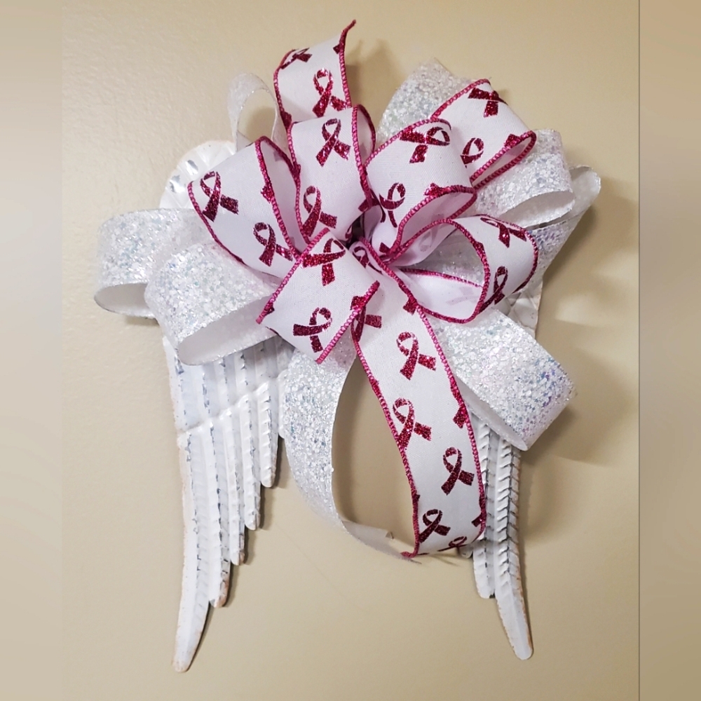 Metal angel wings with breast cancer ribbon